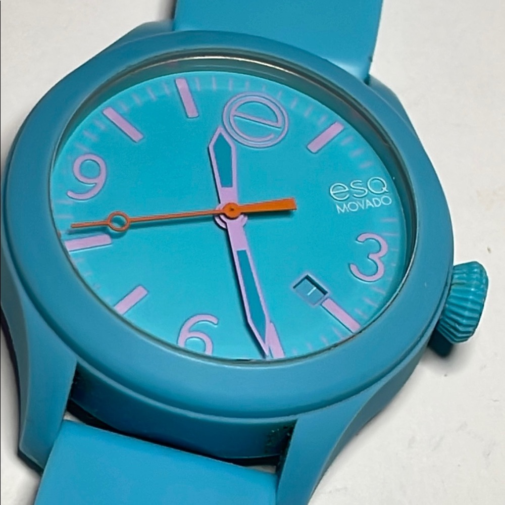 ESQ MOVADO Turquoise Smartwatch with Round Face and Date Window like new